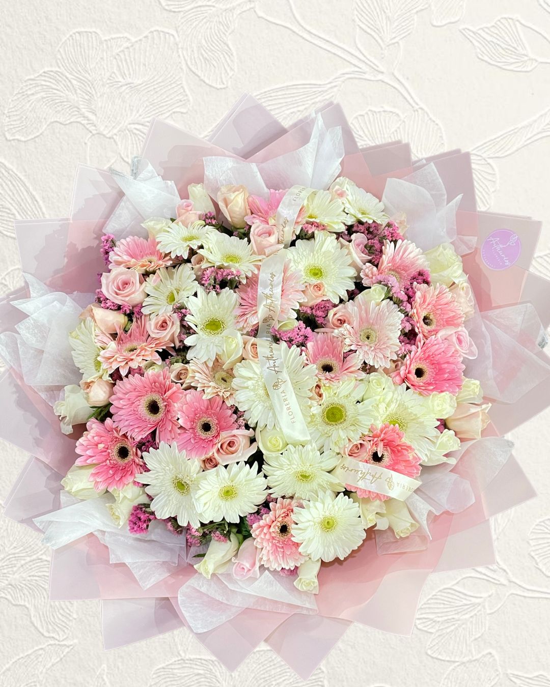 24 gerberas + 50 rosas